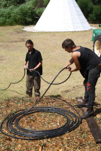 coiling the polly pipe inside the compost