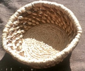 A Norfolk Pine-Needle Coiled Basket made by Cynamon 